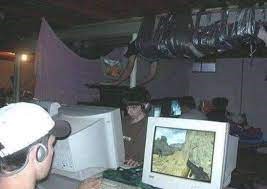 Famous picture of a guy who is duct-taped to the roof in some random LAN-party